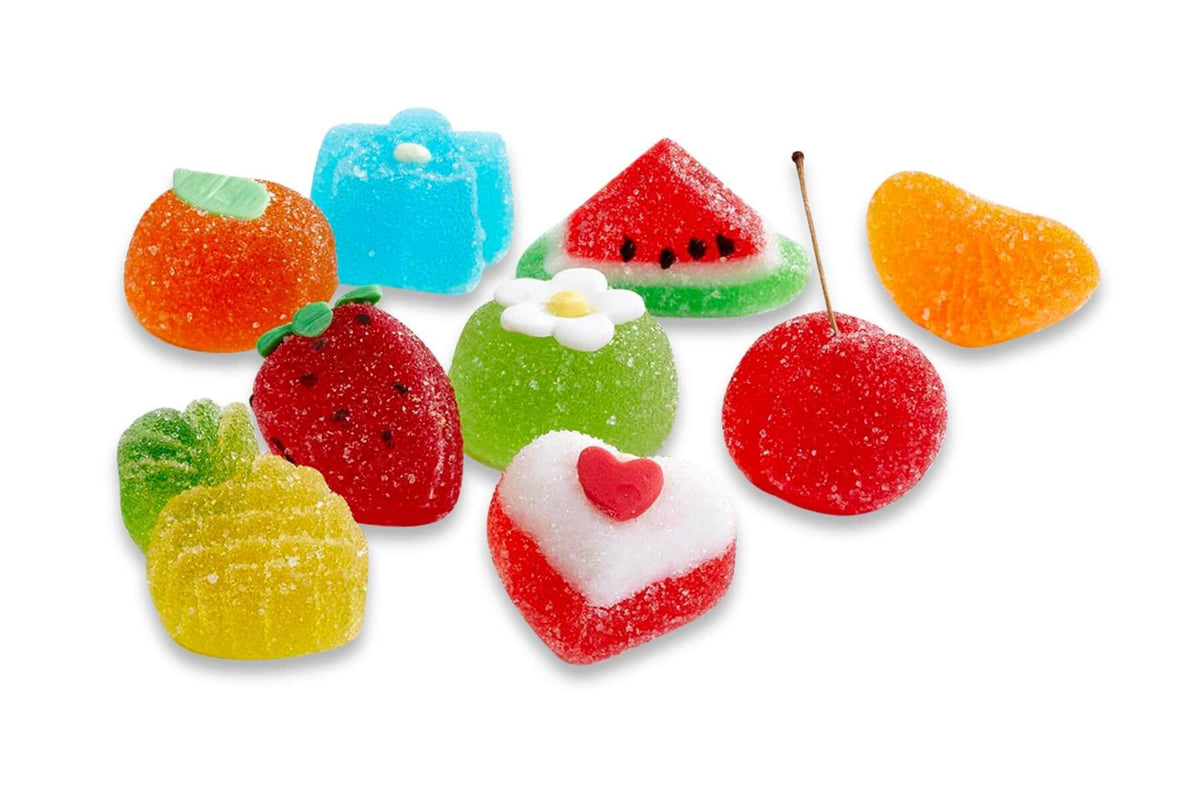 Scatola da 9 gelatine di frutta assortite Iginio Massari, in eleganti colori naturali e forme ispirate a fiori e frutti.